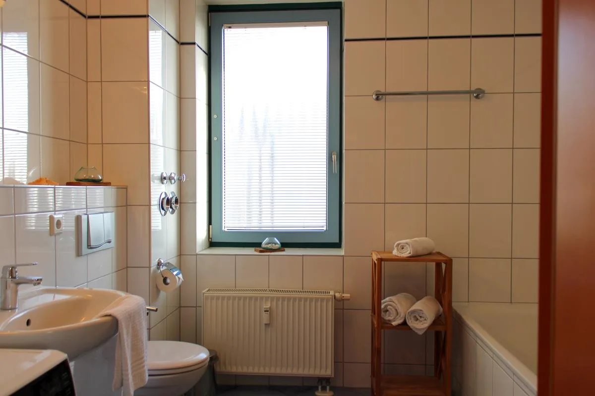 Inselblume 55 - Ferienwohnung in der Strandburg mit Hund