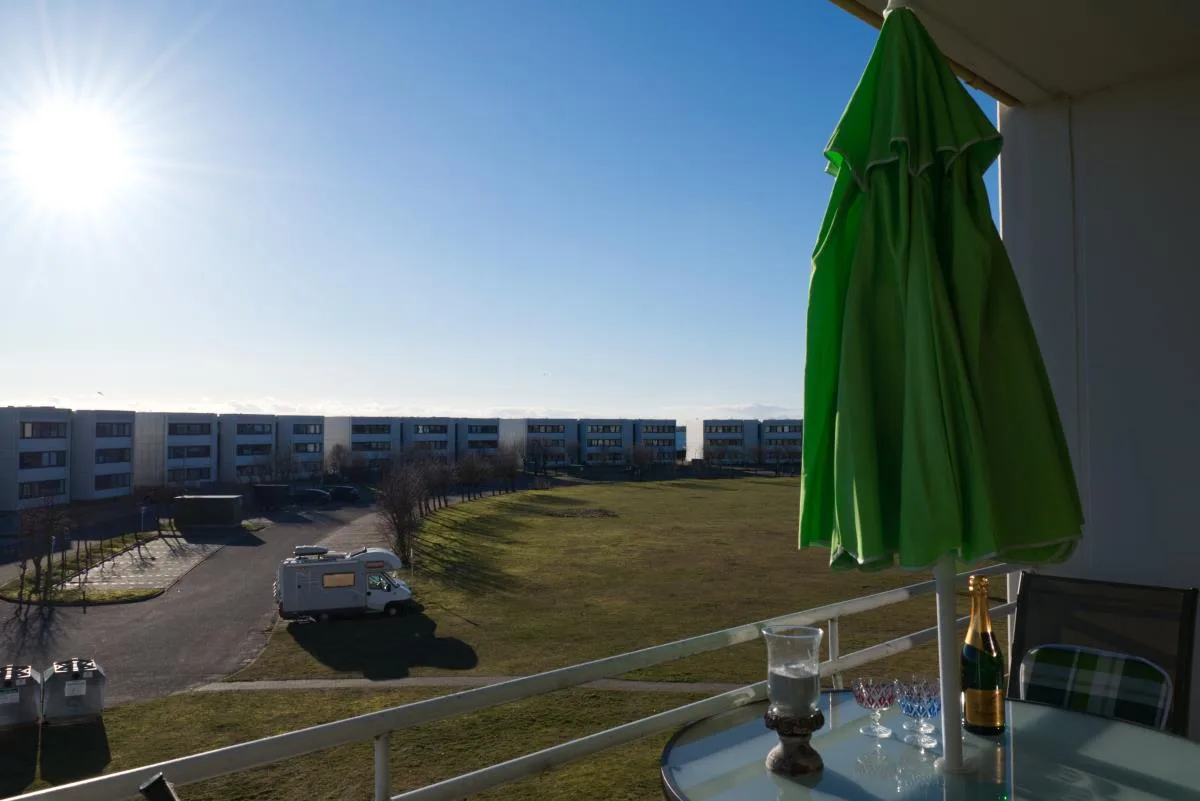 Inselblume 74 - Ferienwohnung mit Balkon am Yachthafen
