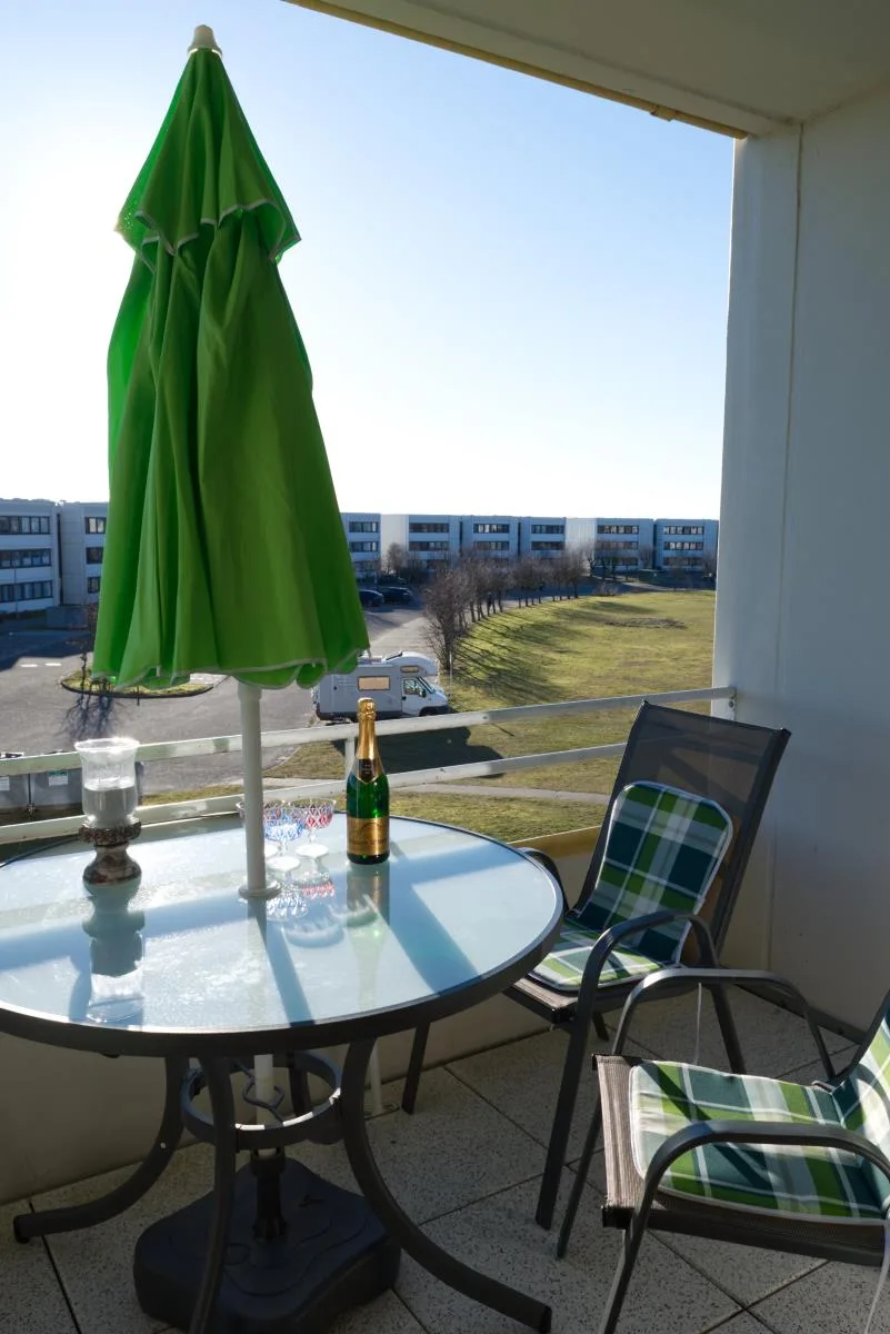 Inselblume 74 - Ferienwohnung mit Balkon am Yachthafen