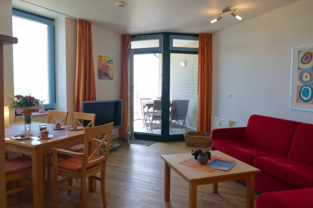 Inselblume 01 - Ferienwohnung mit Meerblick und Balkon am Südstrand
