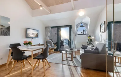 Inselblume 18 - Ferienwohnung mit Meerblick & Galerie in der Strandburg B3.4