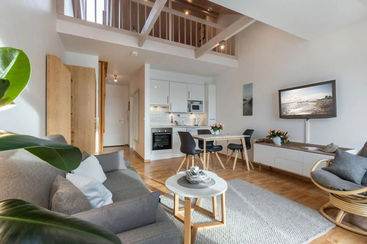Inselblume 18 - Ferienwohnung mit Meerblick & Galerie in der Strandburg B3.4
