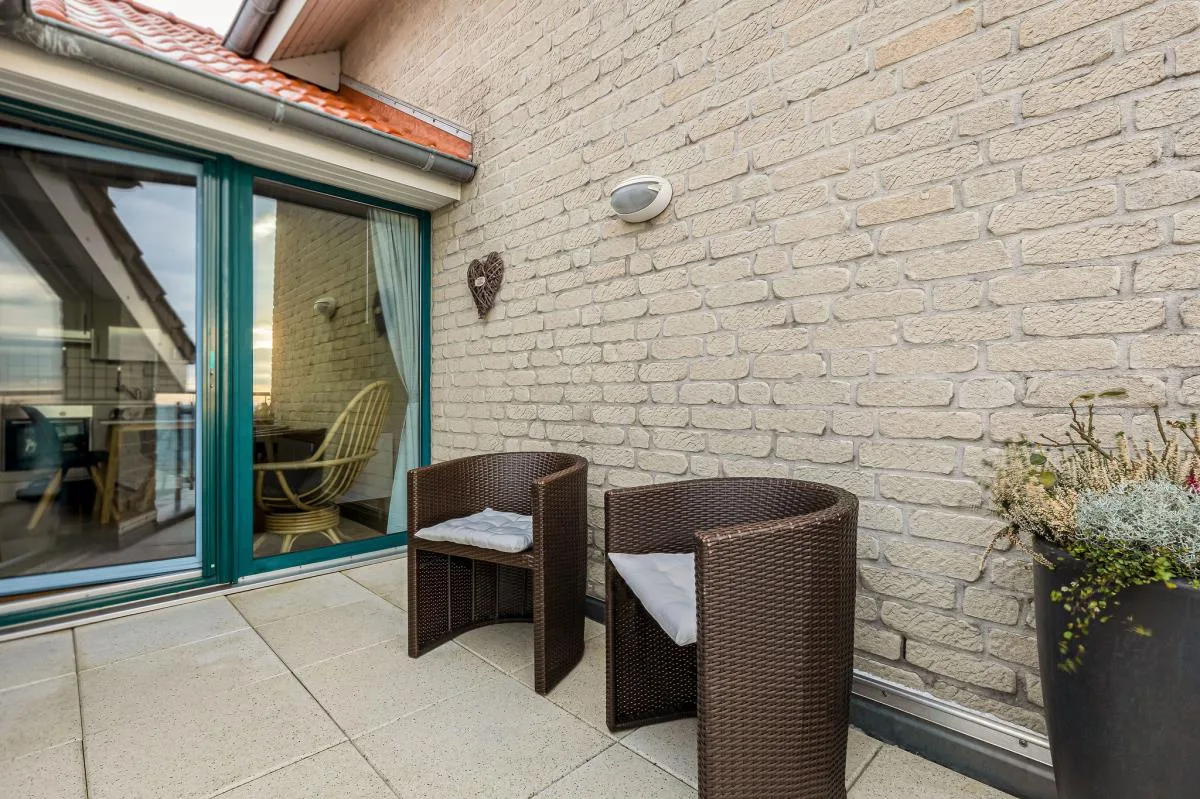 Inselblume 18 - Ferienwohnung mit Meerblick & Galerie in der Strandburg B3.4