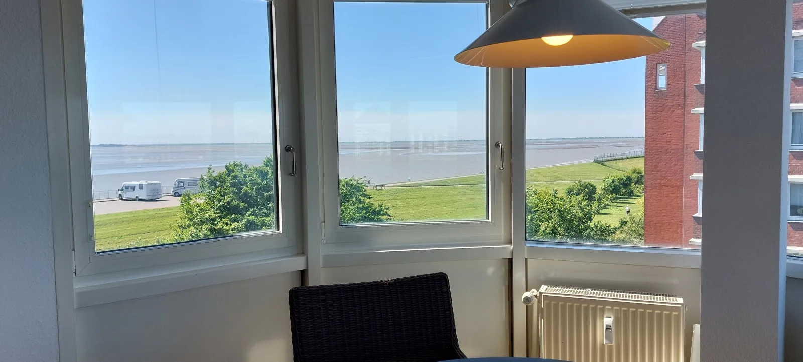 Exklusive Ferienwohnung am Südstrand mit Wintergarten, Balkon & Meerblick | Wohnung 22
