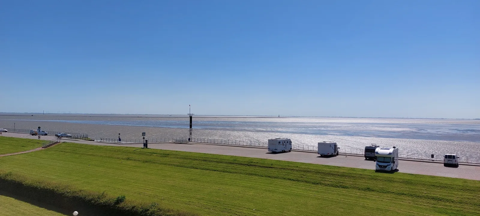 Exklusive Ferienwohnung am Südstrand mit Wintergarten, Balkon & Meerblick | Wohnung 22