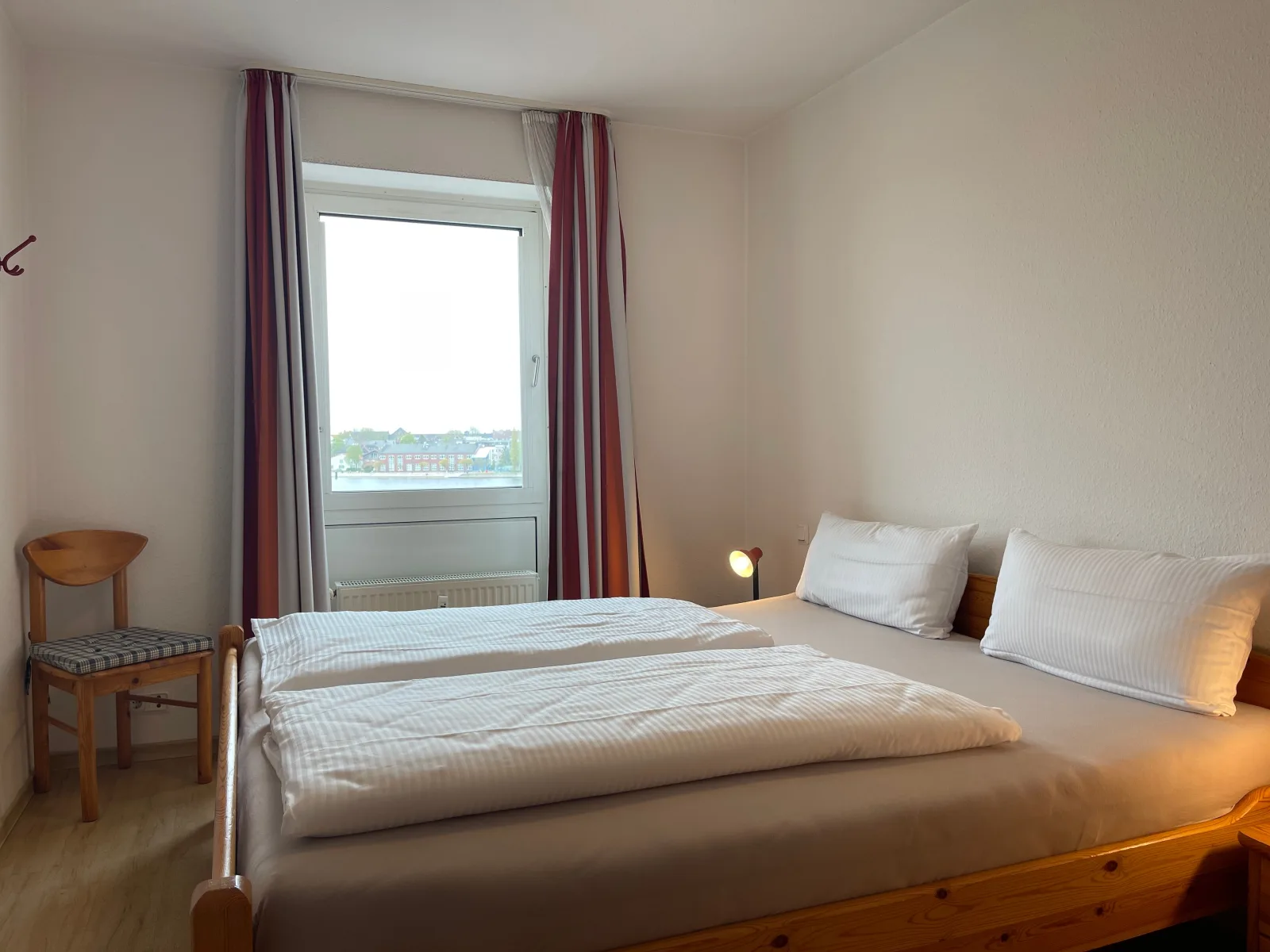 Exklusive Ferienwohnung am Südstrand mit Wintergarten, Balkon & Meerblick | Wohnung 22