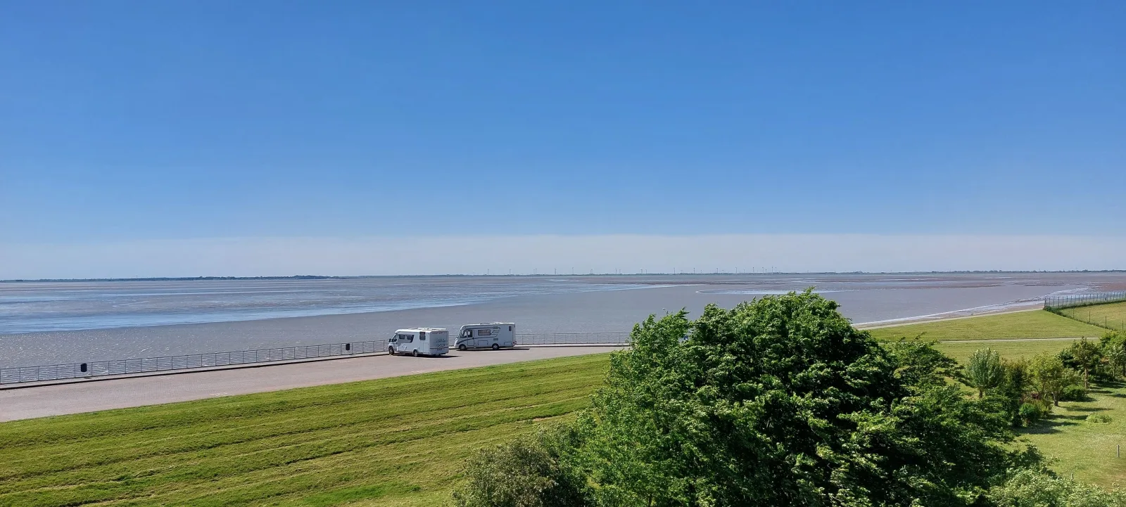 Exklusive Ferienwohnung am Südstrand mit Wintergarten, Balkon & Meerblick | Wohnung 22