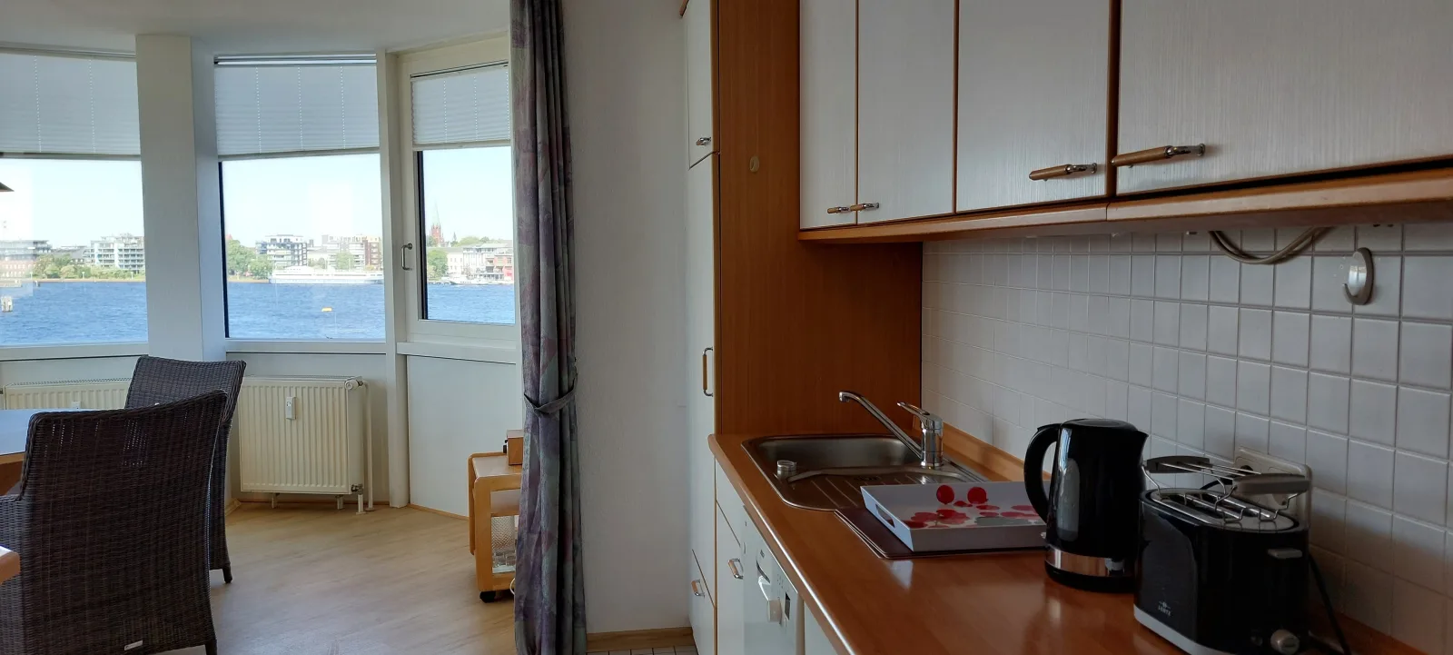 Exklusive Ferienwohnung am Südstrand mit Wintergarten, Balkon & Meerblick | Wohnung 22