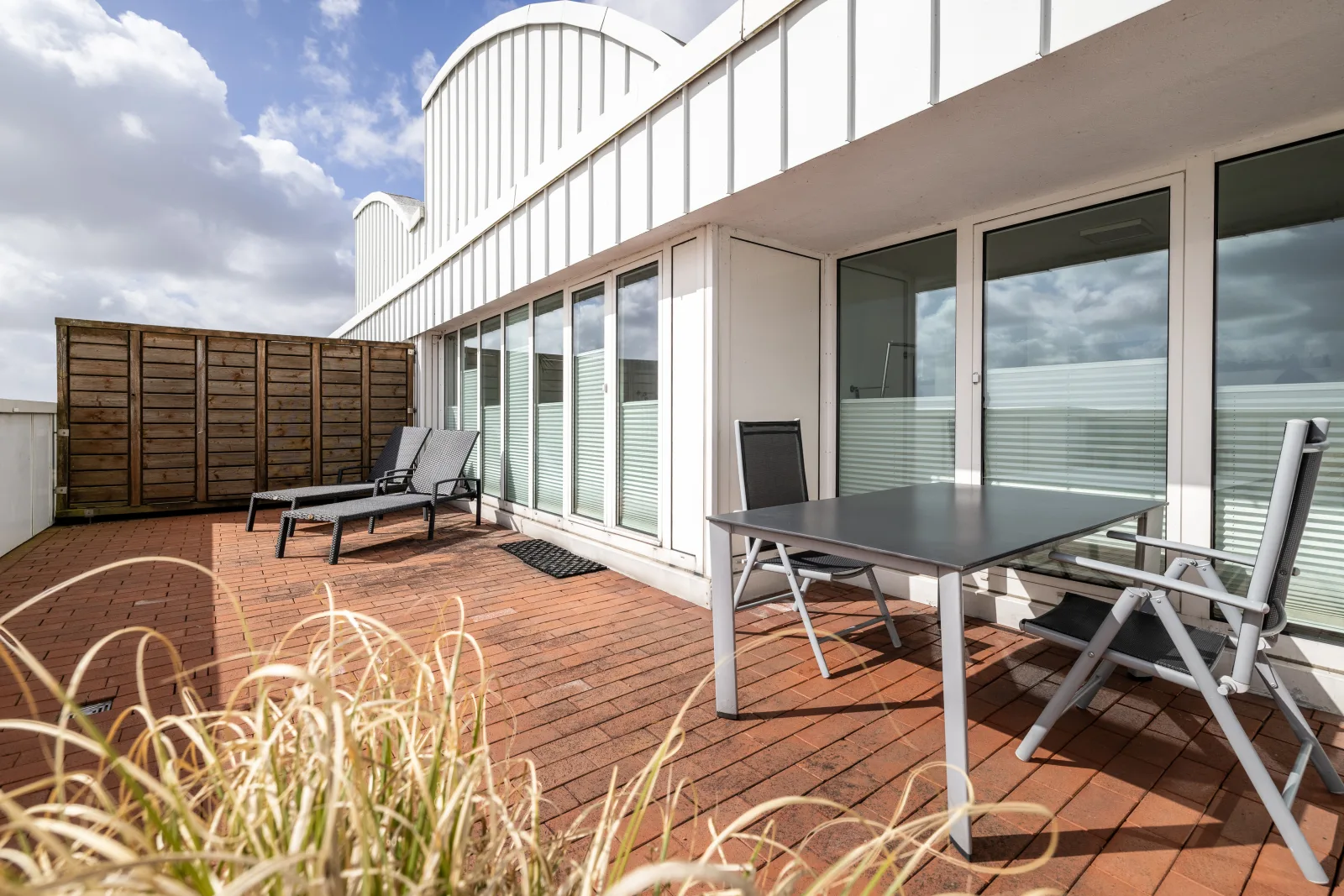 Exklusives Penthouse am Südstrand mit Dachterrasse & Meerblick | Wohnung 37