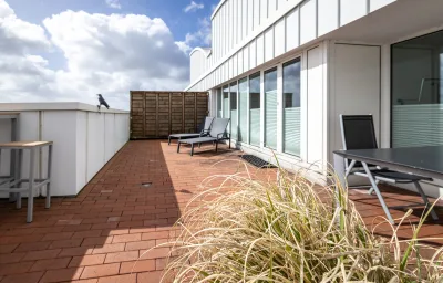 Exklusives Penthouse am Südstrand mit Dachterrasse & Meerblick | Wohnung 37