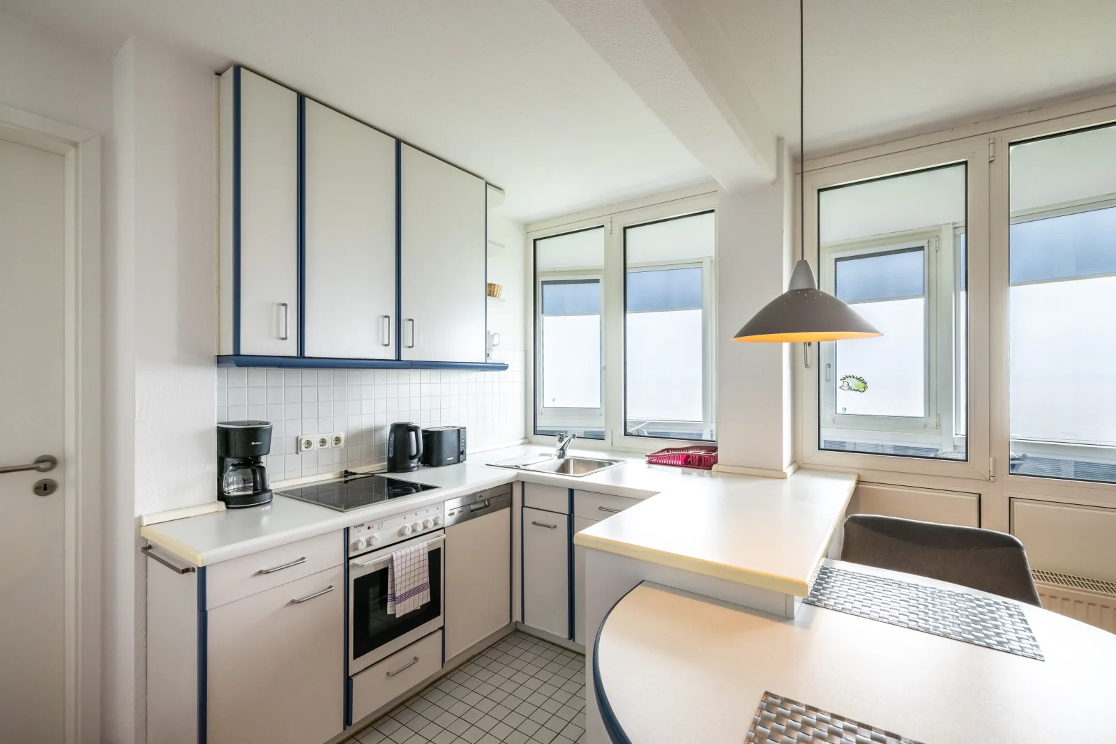 Gemütliche Ferienwohnung mit Wintergarten & Meerblick am Südstrand | Wohnung 123