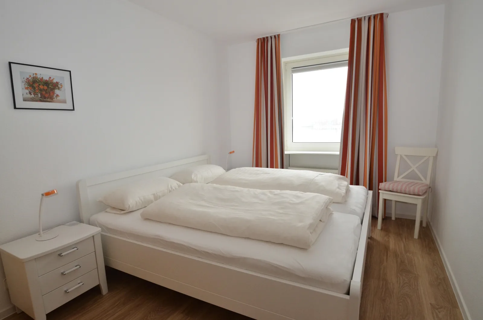 Exklusive Ferienwohnung am Südstrand mit Wintergarten & Hafenblick | Wohnung 113