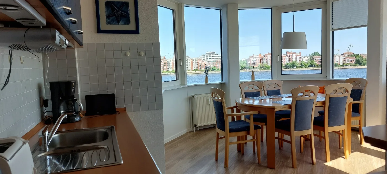 Exklusive Ferienwohnung am Südstrand mit Wintergarten & Hafenblick | Wohnung 113