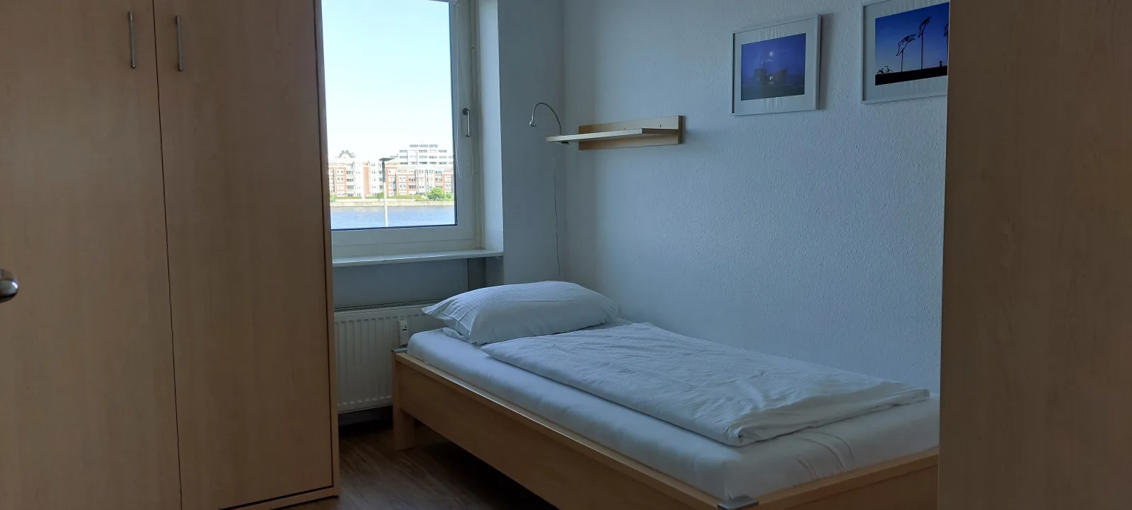 Exklusive Ferienwohnung am Südstrand mit Wintergarten & Hafenblick | Wohnung 113