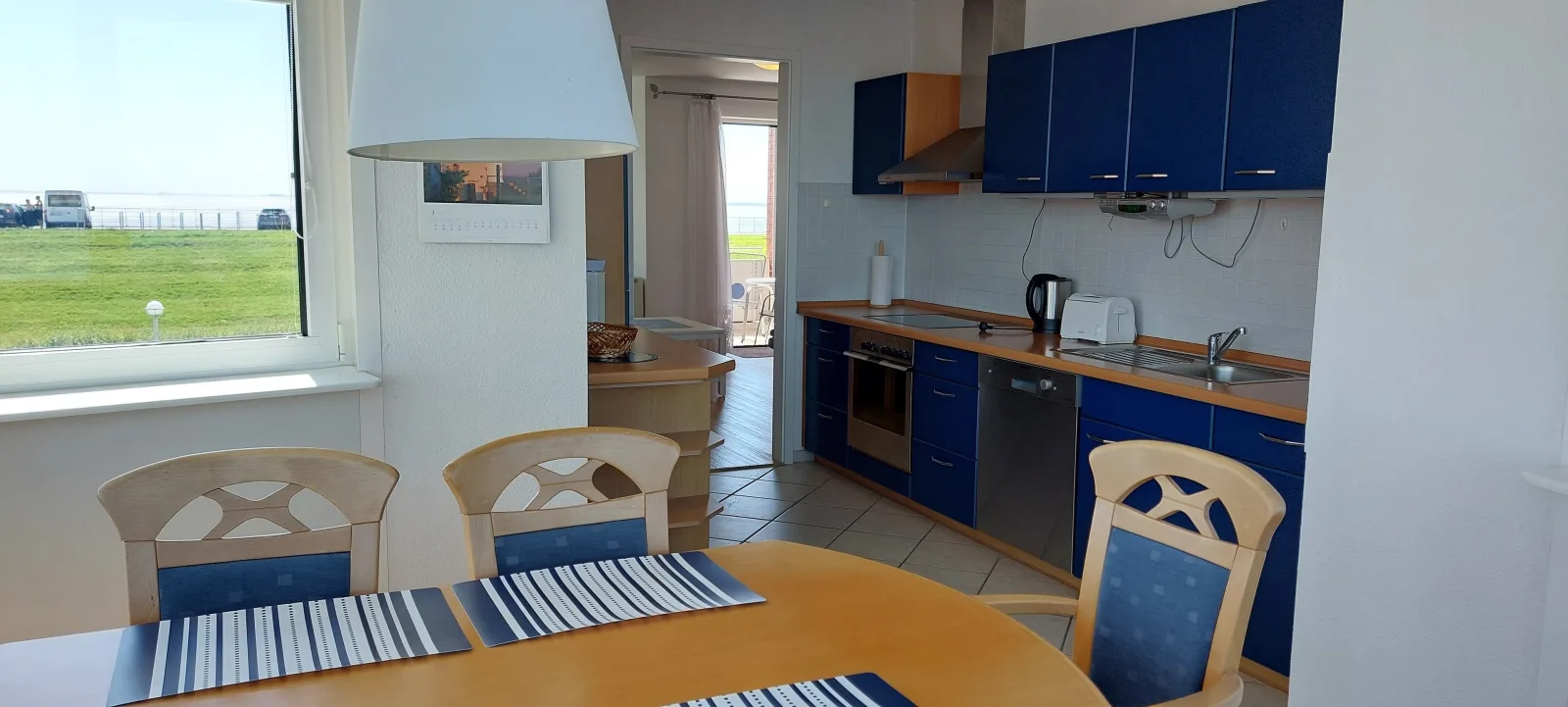Exklusive Ferienwohnung am Südstrand mit Wintergarten & Hafenblick | Wohnung 113