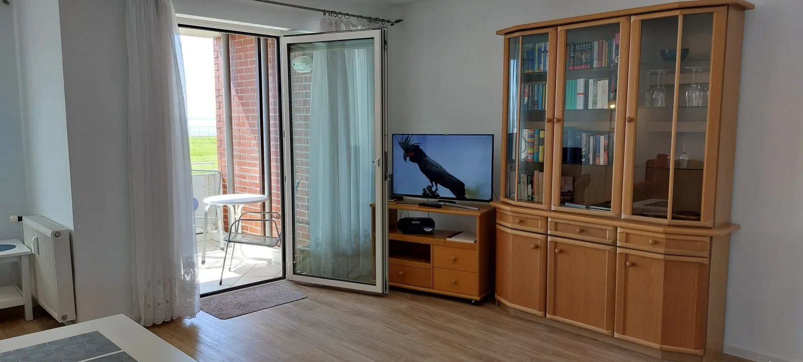 Exklusive Ferienwohnung am Südstrand mit Wintergarten & Hafenblick | Wohnung 113