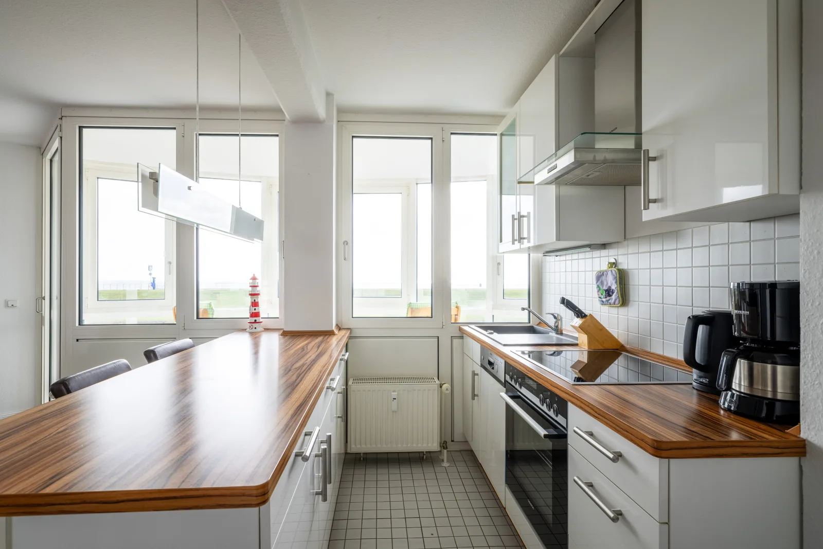 Komfortable Ferienwohnung für 2 am Südstrand mit Wintergarten & Meerblick | Wohnung 12