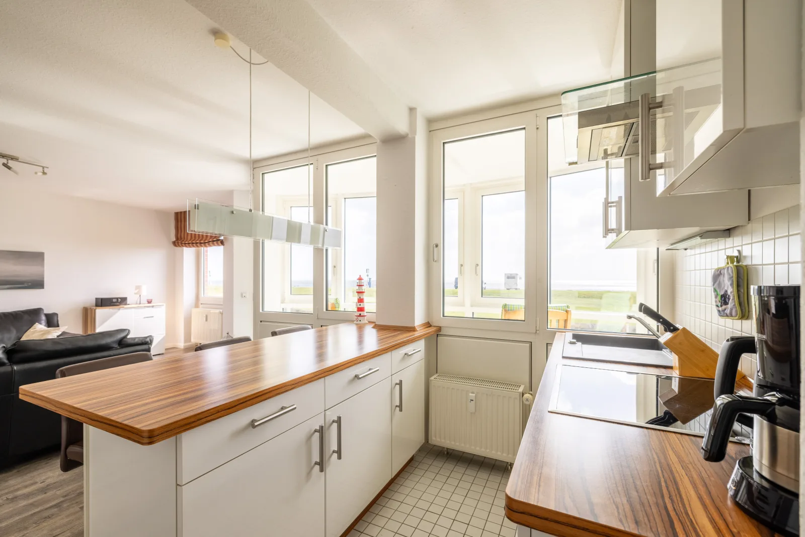 Komfortable Ferienwohnung für 2 am Südstrand mit Wintergarten & Meerblick | Wohnung 12