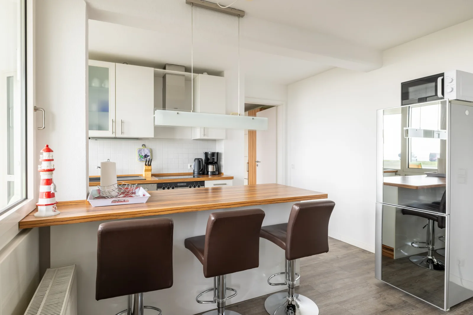 Komfortable Ferienwohnung für 2 am Südstrand mit Wintergarten & Meerblick | Wohnung 12