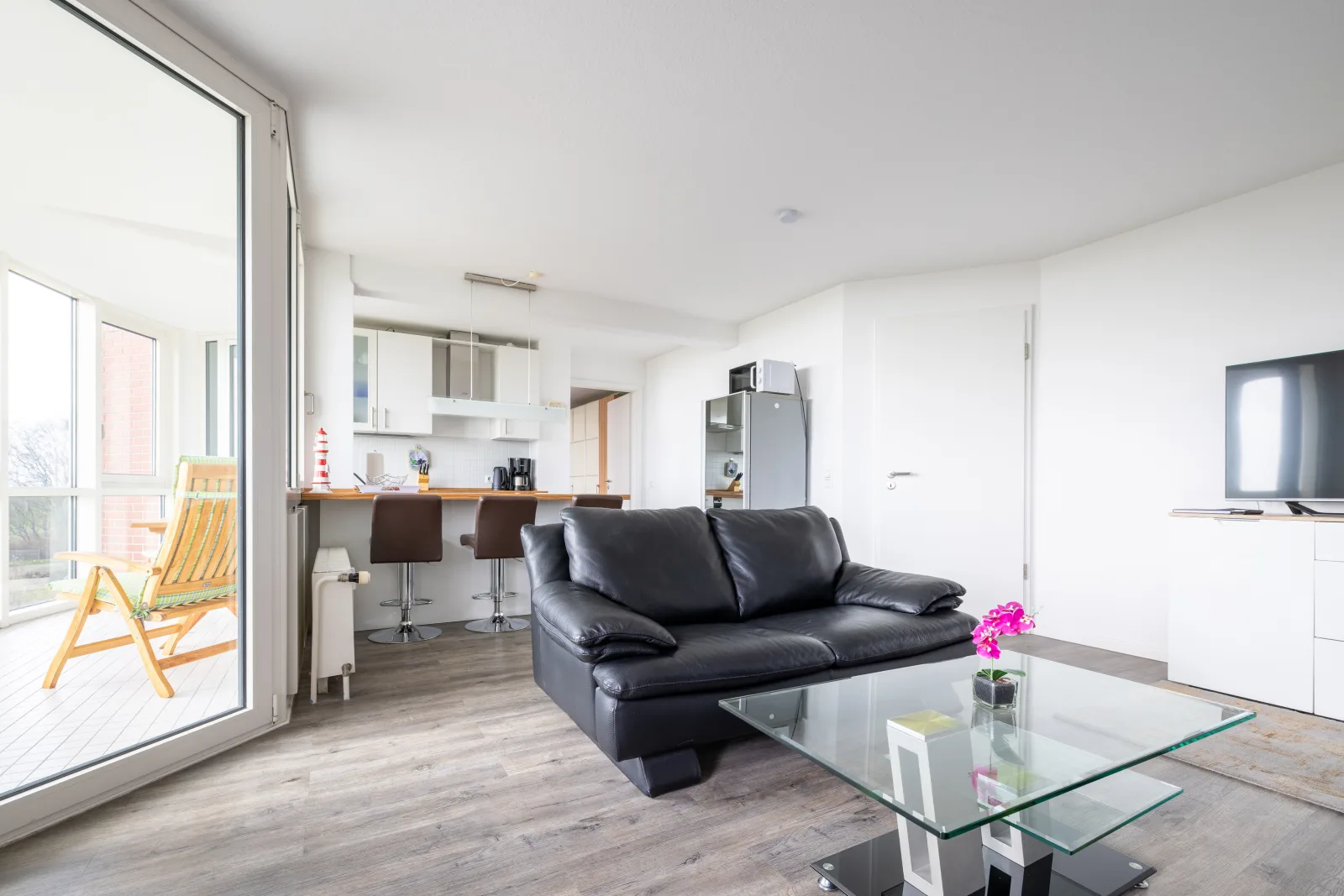 Komfortable Ferienwohnung für 2 am Südstrand mit Wintergarten & Meerblick | Wohnung 12