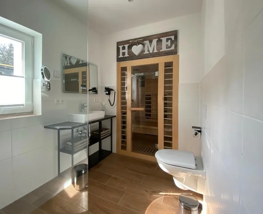 Ferienhaus Bimmelbahn 2 - Familienferienhaus 100 m²  am Dampflokbahnhof / Sauna / Trampolin/ Spielezimmer