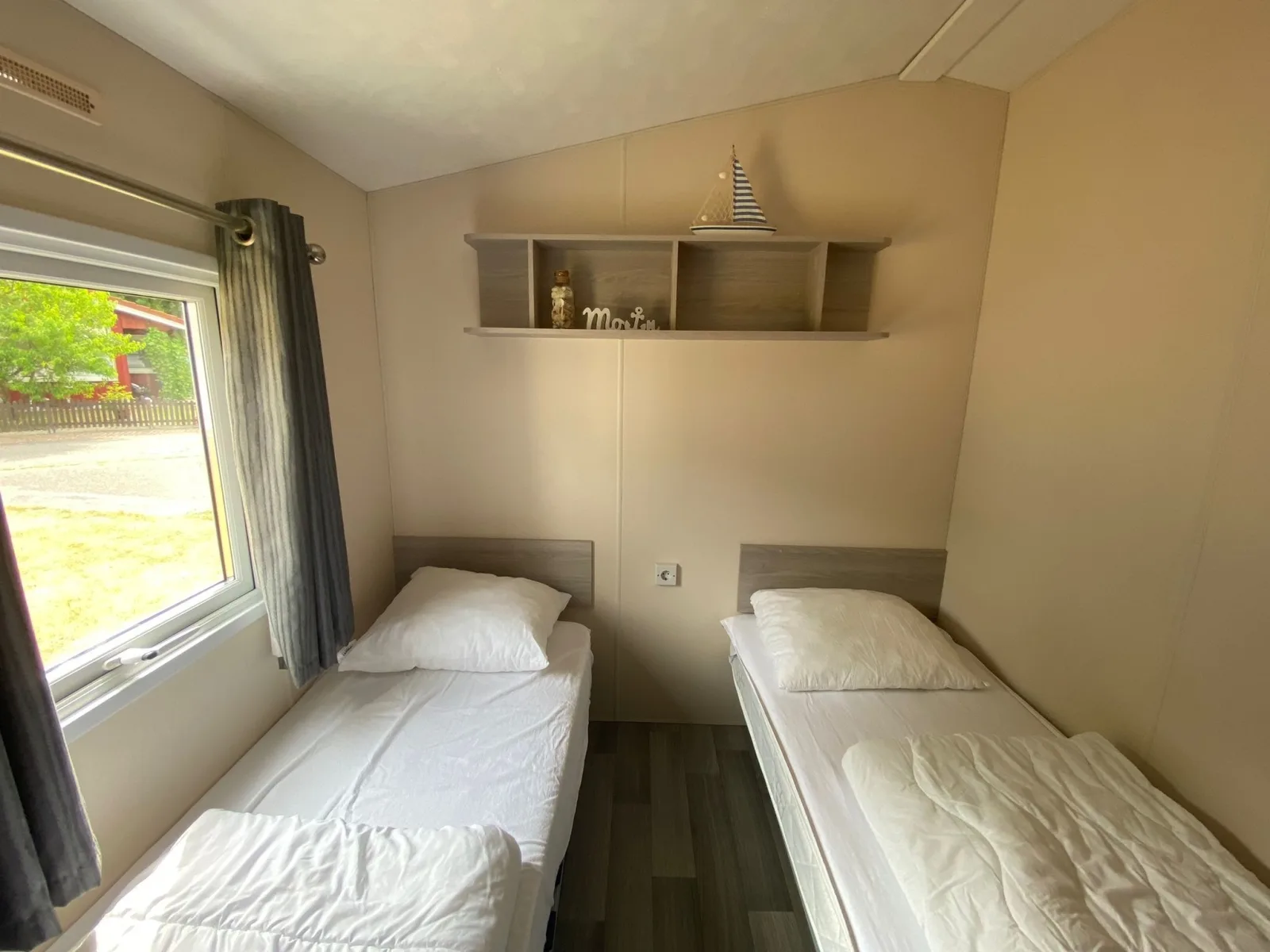 Mobilheim Wattwurm mit Veranda am Kransburger See (555)