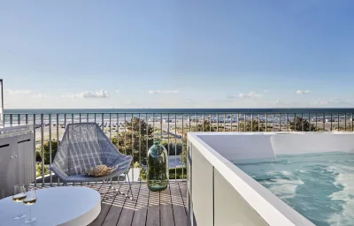 Baltic Hideaway Beach Hotel Warnemünde - Sky Suite mit Dachterrasse und Meerblick-Whirlpool