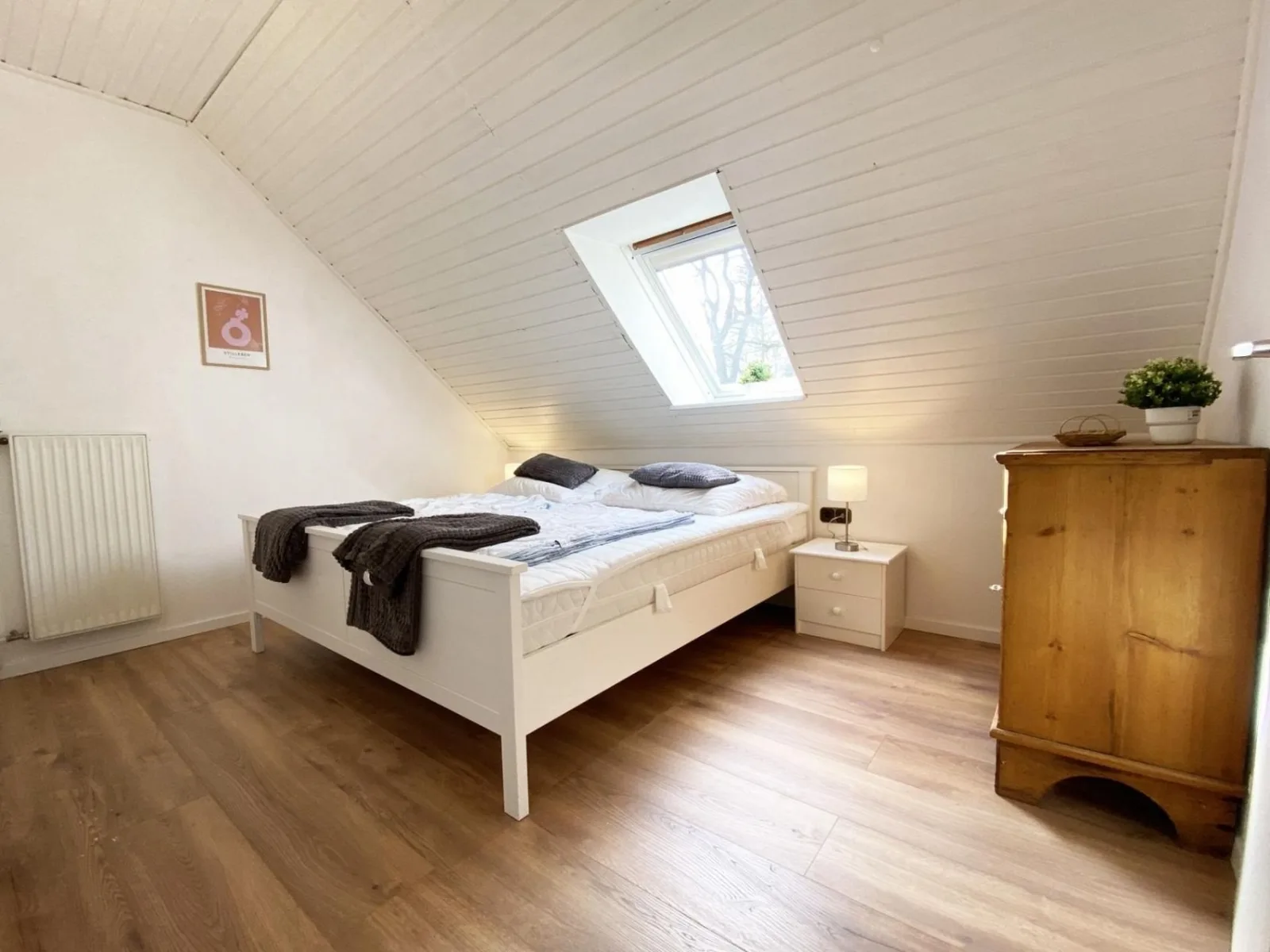 Ferien im Wangerland - Haus Wiesenweg - Ferienwohnung  1 (1.OG)