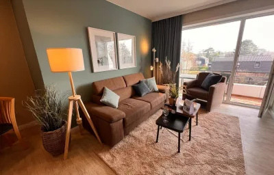 Ferienwohnung  NW 38 mit Süd Balkon