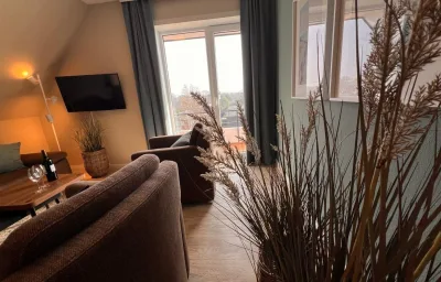 Ferienwohnung  NW 45 mit Süd Balkon