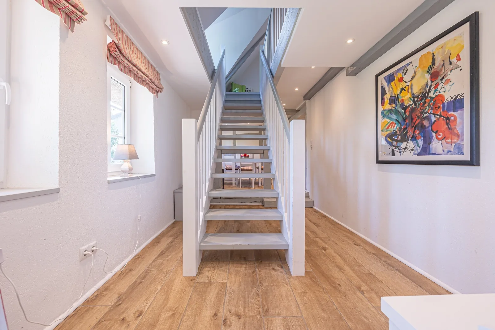 Weiße Reetdachkate Wohnung 1