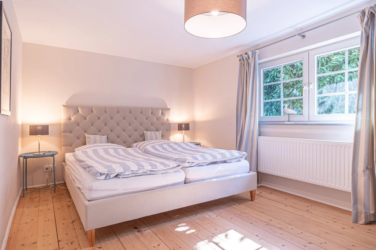 Weiße Reetdachkate Wohnung 1