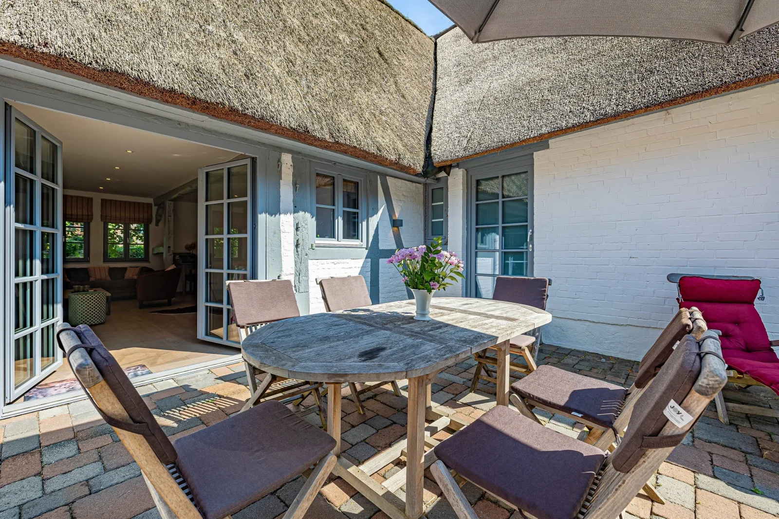 Weiße Reetdachkate Wohnung 2