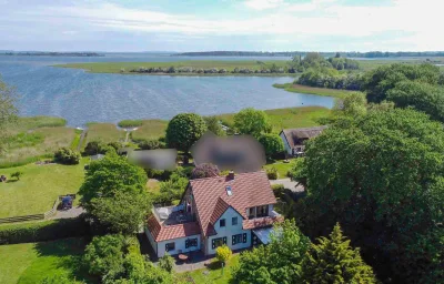 Familienferienhaus Rügenbrise - Gemeinsames Urlauben mit Steg und Boot auf Rügen - alles inklusive und 5 Bäder