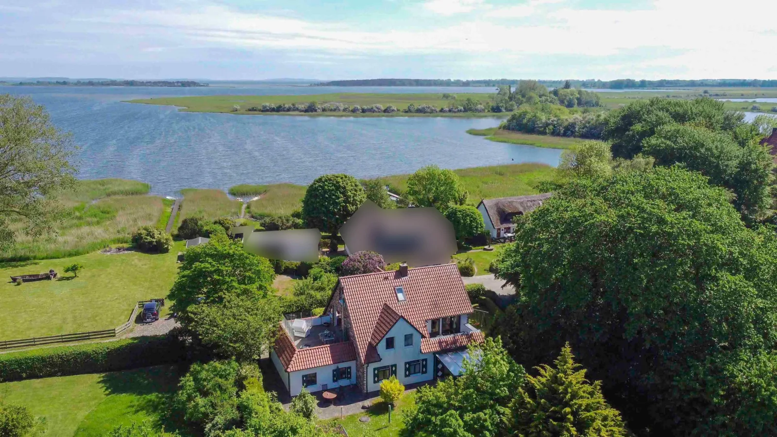 Ferienwohnung - Rügenbrise am Wasser mit Steg und Paddelboot - alles inklusive