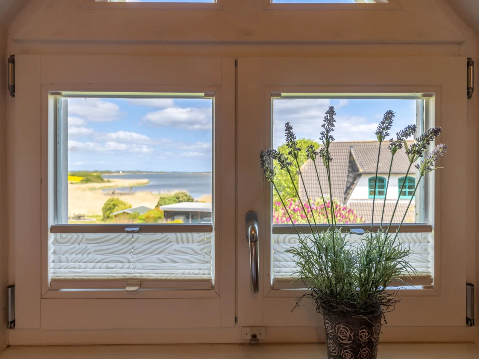 Ferienwohnung - Rügenbrise mit Seeblick mit 3 Bädern, Steg und Paddelboot - alle inklusive