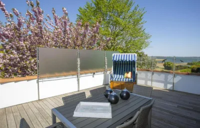 Ferienwohnung - Rügenbrise mit Seeblick mit 3 Bädern, Steg und Paddelboot - alle inklusive