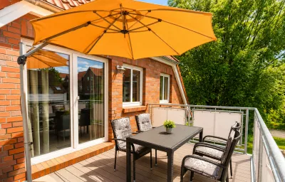 *Neu* FeWo No. 4 Friesenhuus Carolinensiel mit großem Balkon und Fahrradgarage in top Lage